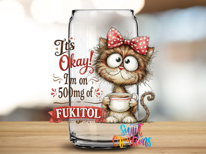 Fukitol Cat design close-up on a clear glass can tumbler