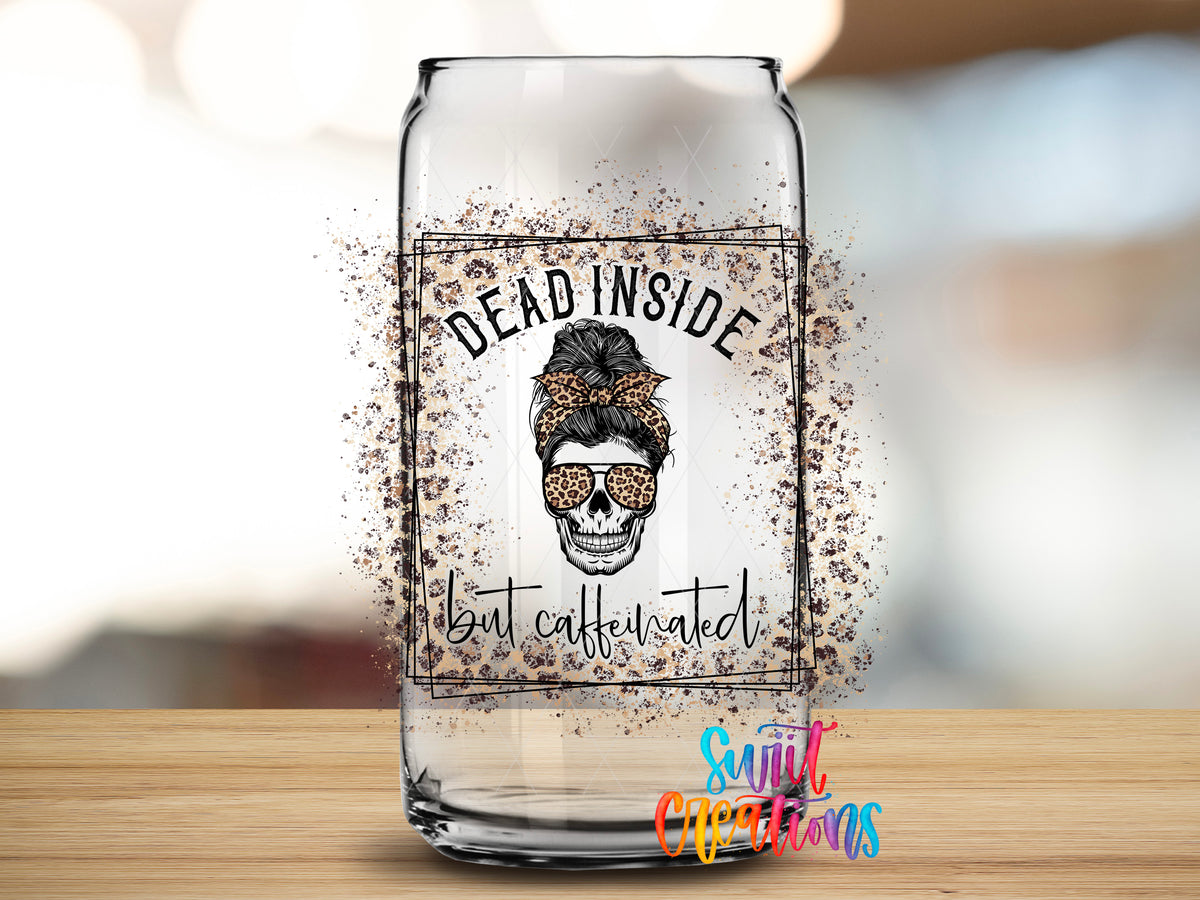 Dead Inside But Caffeinated Leopard design close-up on a clear glass can tumbler