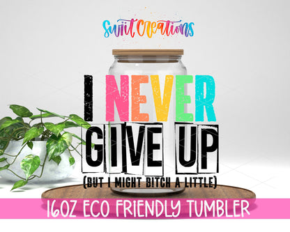 I Never Give Up design on a 16 oz clear glass tumbler with bamboo lid