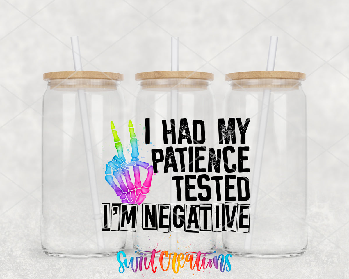 Patience Tested I Am Negative clear glass tumbler group mockup with bamboo lids and straws