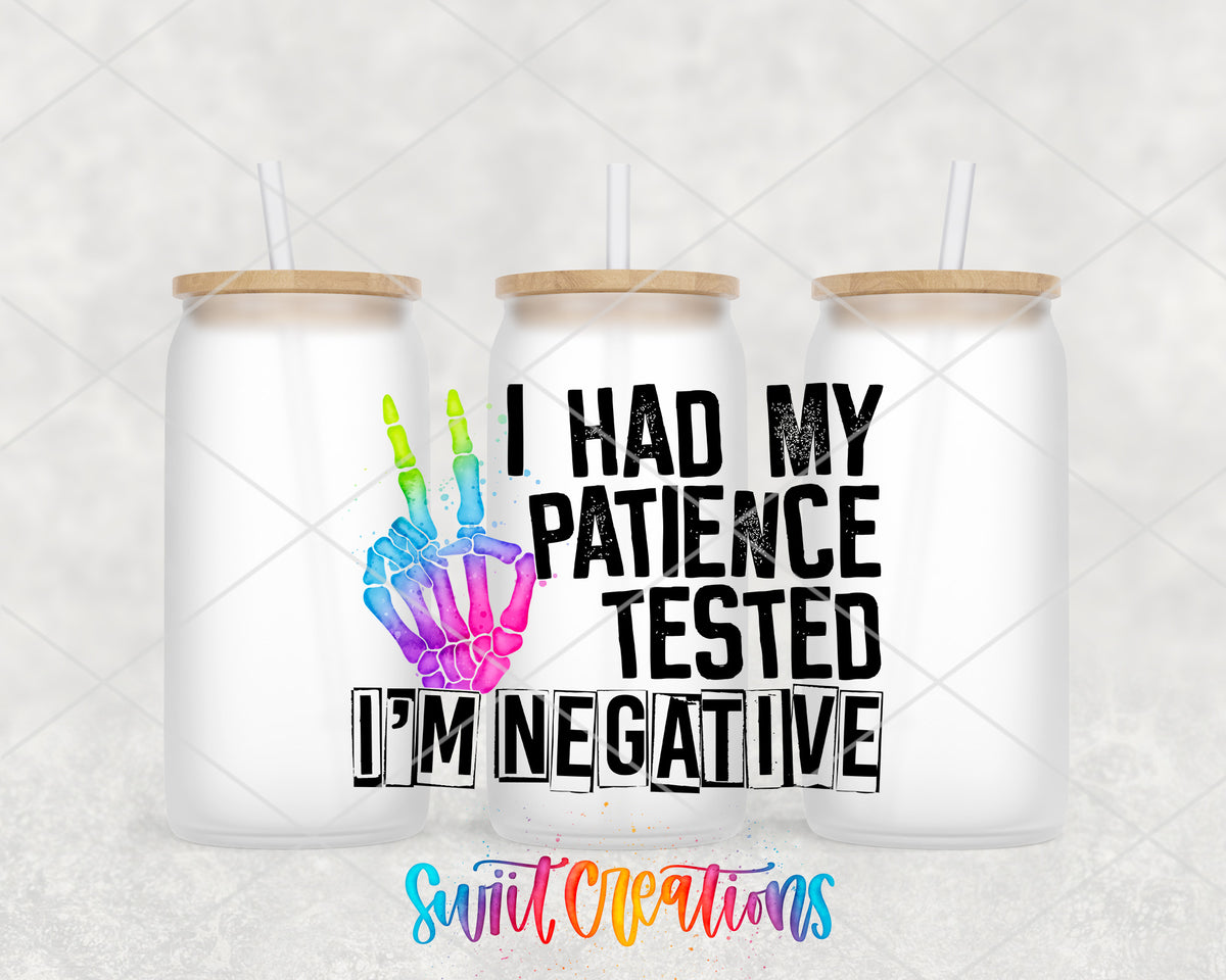 Patience Tested I Am Negative frosted glass tumbler group view with lids and straws