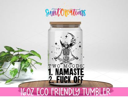 Two Moods Namaste design on a 16 oz clear glass tumbler with bamboo lid
