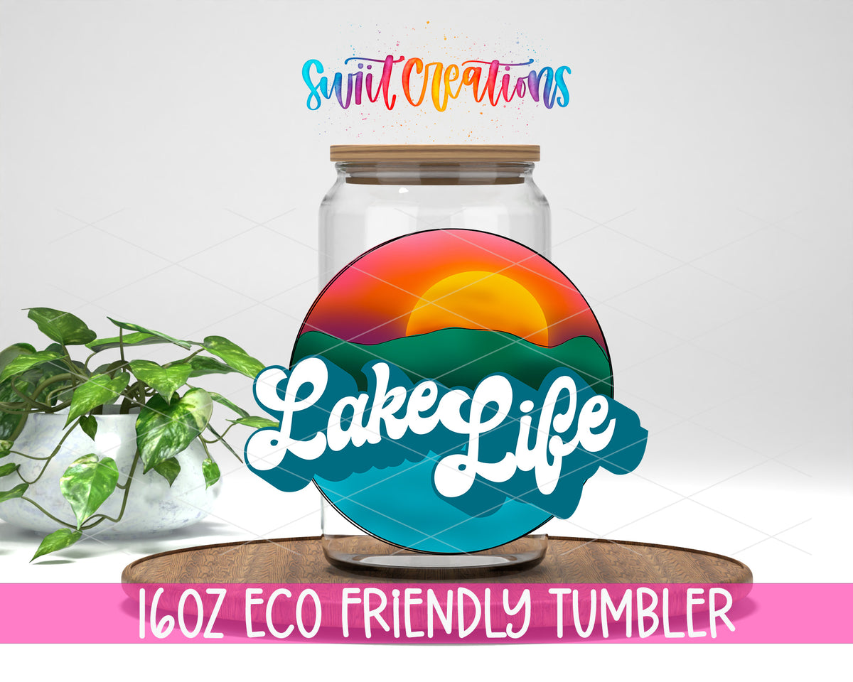 Sunset Lake Life design on a 16 oz clear glass tumbler with bamboo lid