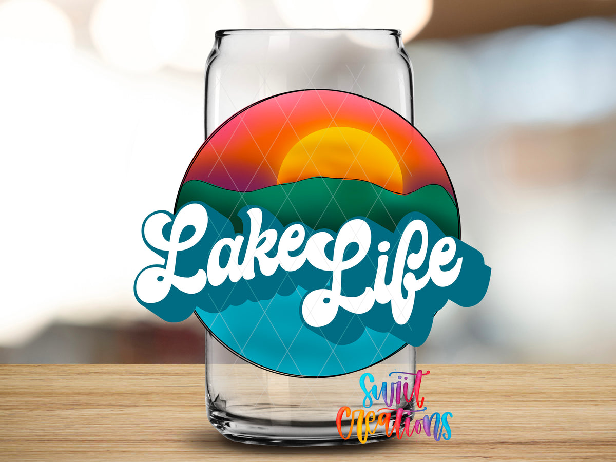 Sunset Lake Life design close-up on a clear glass can tumbler