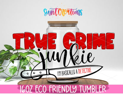 True Crime Junkie design on a 16 oz clear glass tumbler with bamboo lid