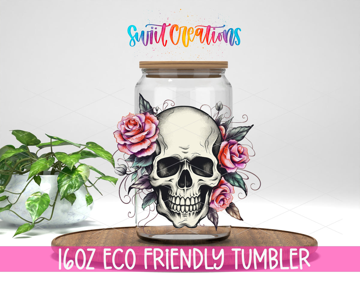 Pink Rose Floral Skull design on a 16 oz clear glass tumbler with bamboo lid