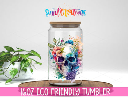 Watercolor Floral Skull design on a 16 oz clear glass tumbler with bamboo lid