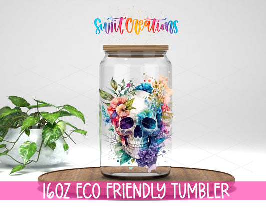 Watercolor Floral Skull design on a 16 oz clear glass tumbler with bamboo lid