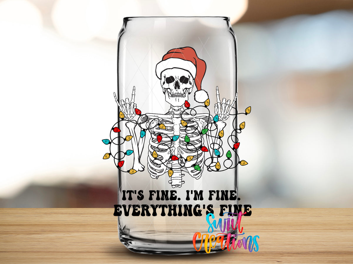 Everything Is Fine Christmas Skeleton design close-up on a clear glass can tumbler