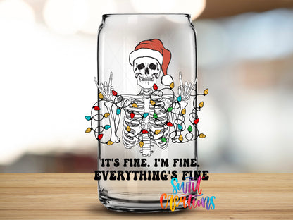Everything Is Fine Christmas Skeleton design close-up on a clear glass can tumbler