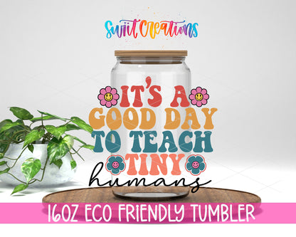 Good Day to Teach Tiny Humans design on a 16 oz clear glass tumbler with bamboo lid