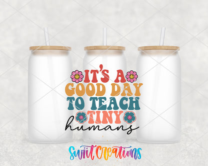 Good Day to Teach Tiny Humans frosted glass tumbler group view with lids and straws
