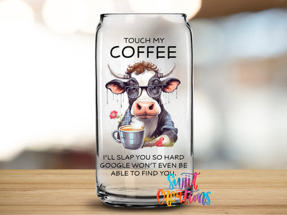 Touch My Coffee Cow design close-up on a clear glass can tumbler