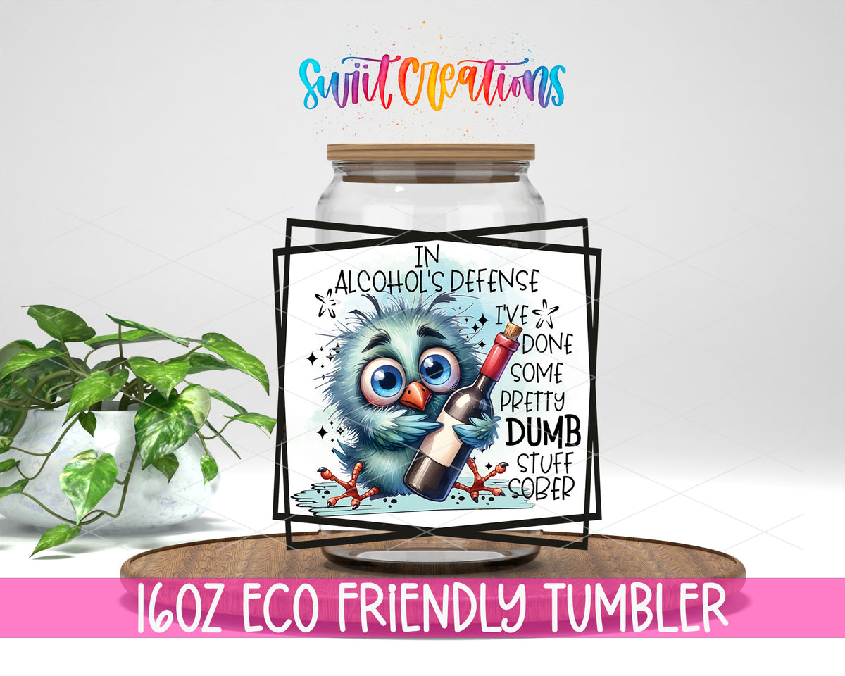 In Alcohols Defense Owl design on a 16 oz clear glass tumbler with bamboo lid