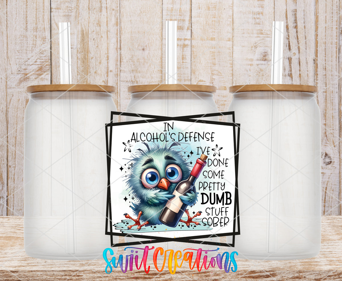 In Alcohols Defense Owl frosted glass tumbler mockup with bamboo lids and straws