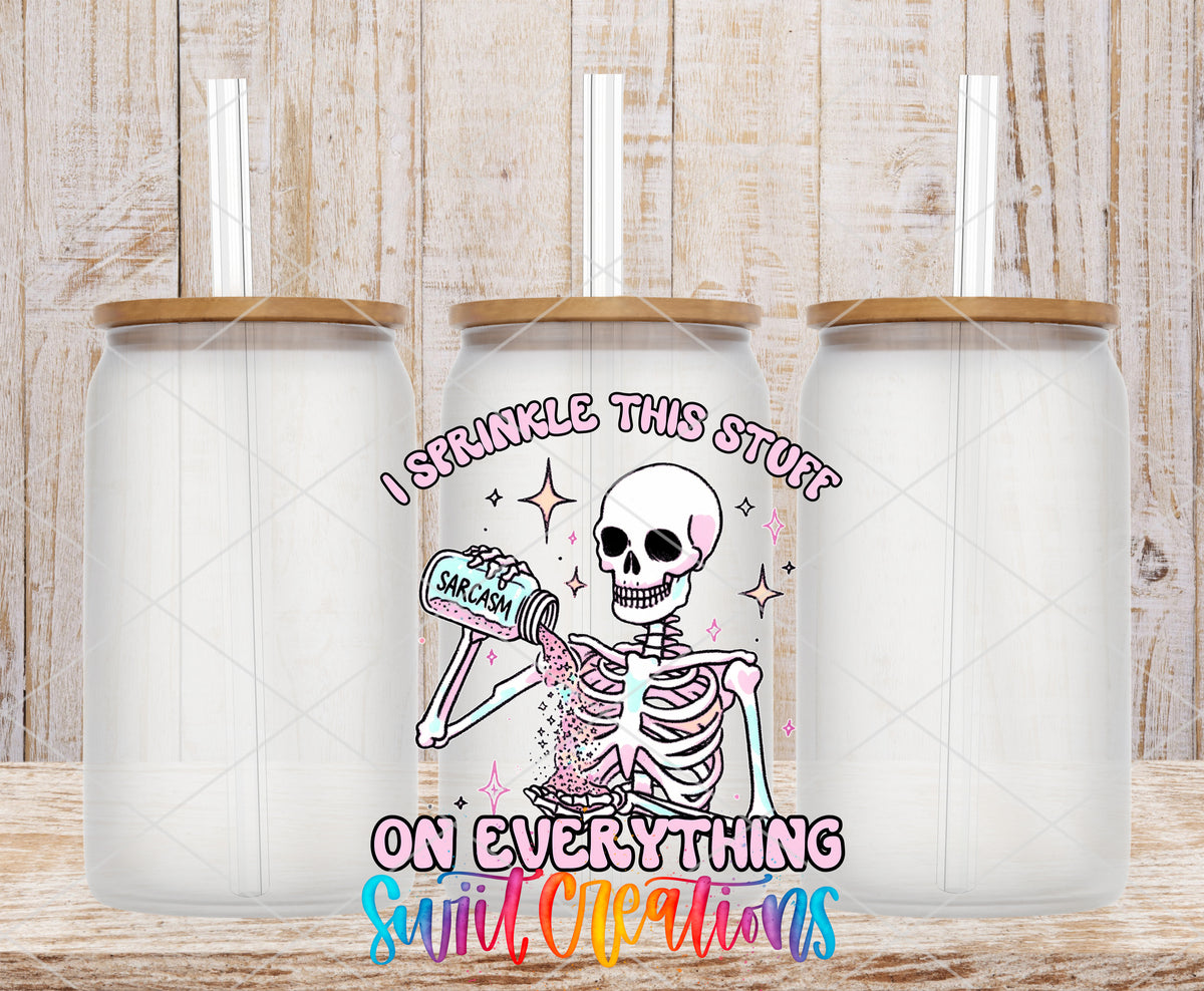 Sprinkle Sarcasm Skeleton frosted glass tumbler mockup with bamboo lids and straws