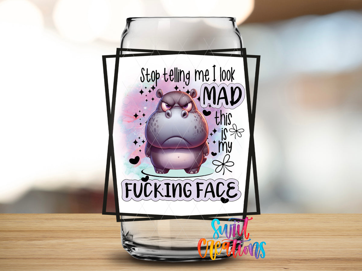 Stop Telling Me I Look Mad design close-up on a clear glass can tumbler