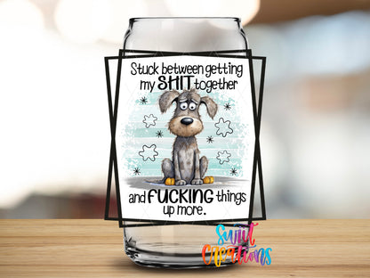 Stuck Between Getting It Together design close-up on a clear glass can tumbler