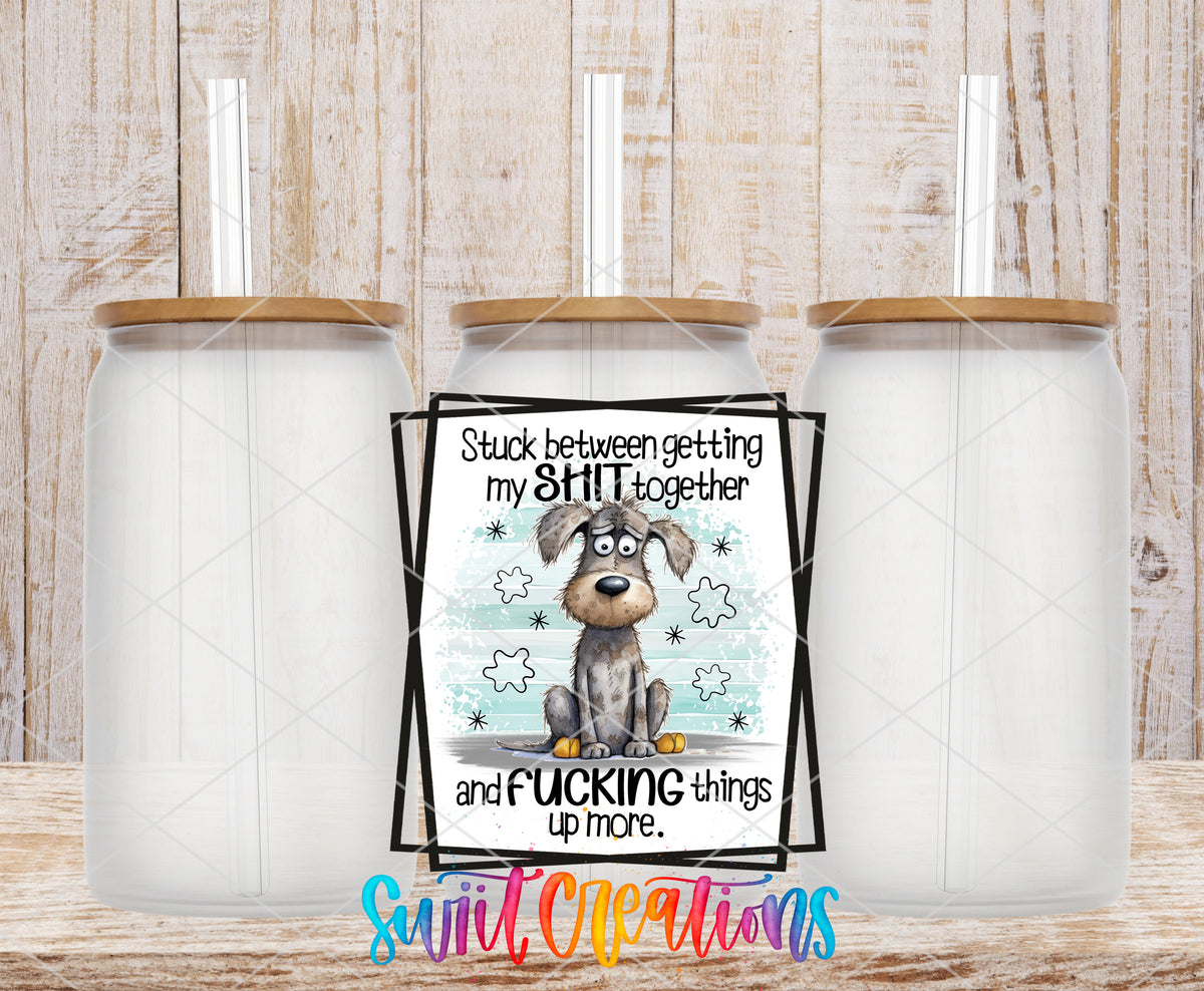 Stuck Between Getting It Together frosted glass tumbler mockup with bamboo lids and straws