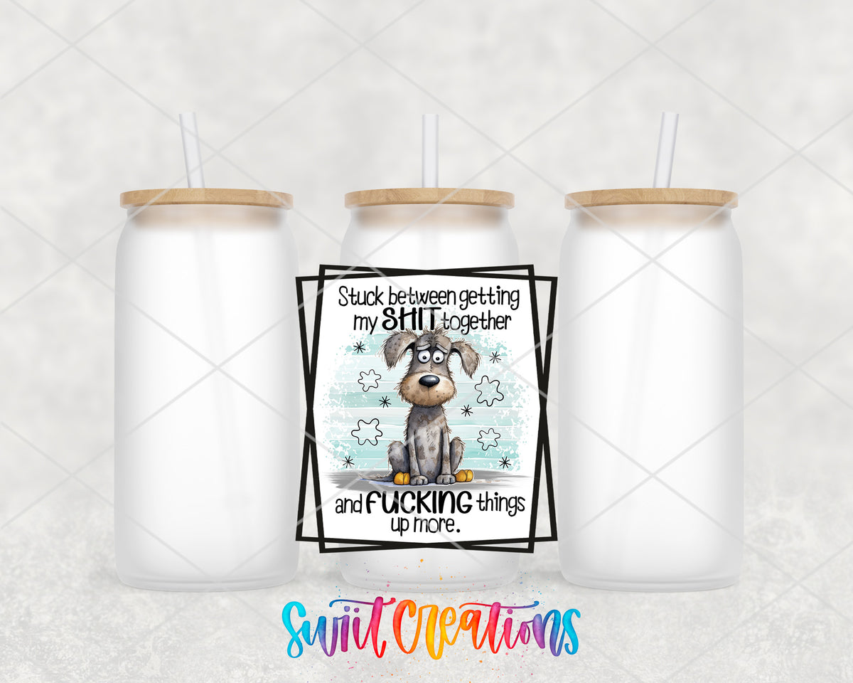 Stuck Between Getting It Together frosted glass tumbler group view with lids and straws