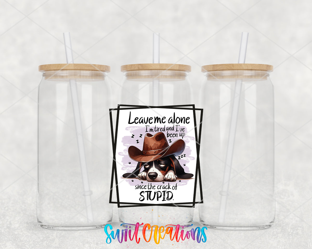 Leave Me Alone Cowboy Dog clear glass tumbler group mockup with bamboo lids and straws