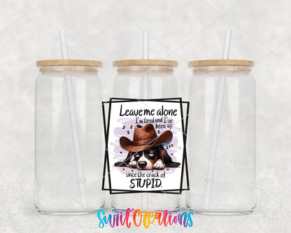 Leave Me Alone Cowboy Dog clear glass tumbler group mockup with bamboo lids and straws