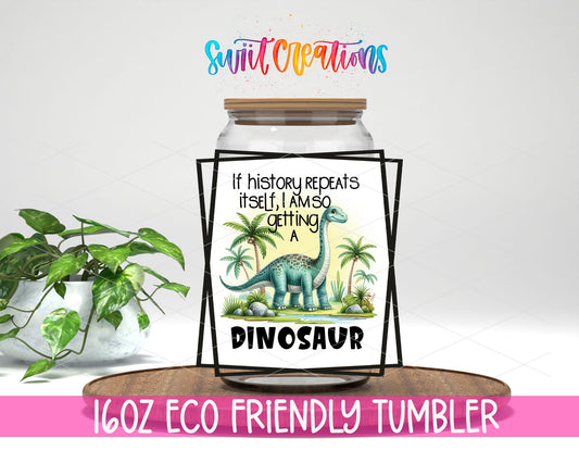 If History Repeats Itself Dinosaur design on a 16 oz clear glass tumbler with bamboo lid