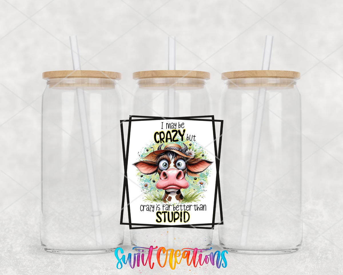 I May Be Crazy Cow clear glass tumbler group mockup with bamboo lids and straws