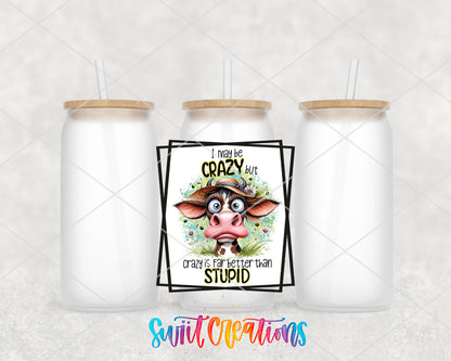 I May Be Crazy Cow frosted glass tumbler group view with lids and straws