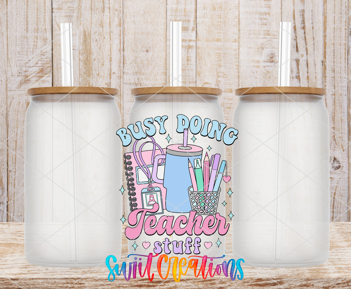 Busy Doing Teacher Stuff frosted glass tumbler mockup with bamboo lids and straws