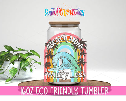 Beach More Worry Less Wave design on a 16 oz clear glass tumbler with bamboo lid