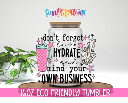 Hydrate and Mind Your Own Business design on a 16 oz clear glass tumbler with bamboo lid