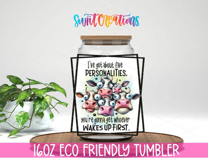 Five Personalities Cow design on a 16 oz clear glass tumbler with bamboo lid