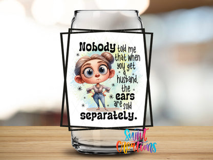 Husband Ears Sold Separately design close-up on a clear glass can tumbler