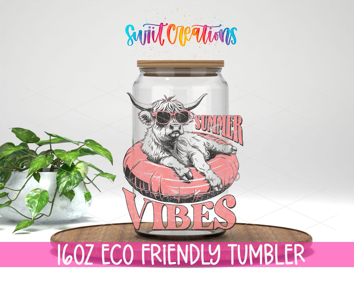 Summer Vibes Cow design on a 16 oz clear glass tumbler with bamboo lid