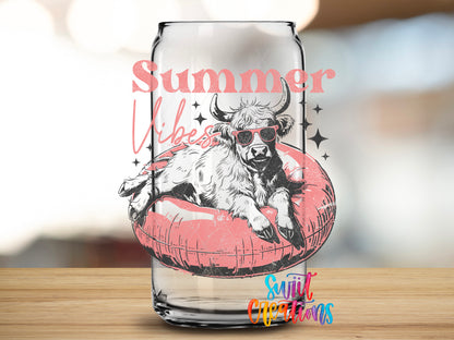 Summer Vibes Cow Pool Float design close-up on a clear glass can tumbler
