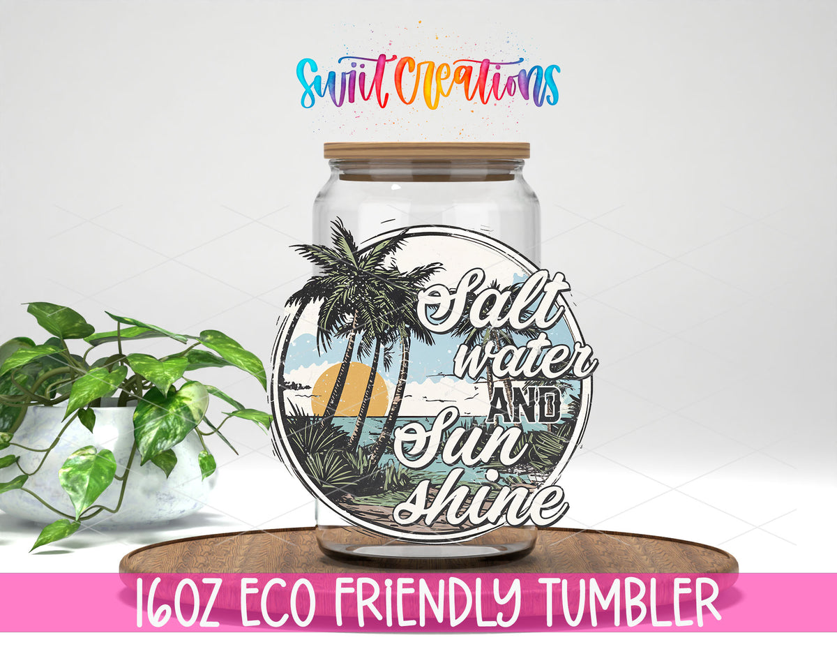 Salt Water and Sunshine Palms design on a 16 oz clear glass tumbler with bamboo lid
