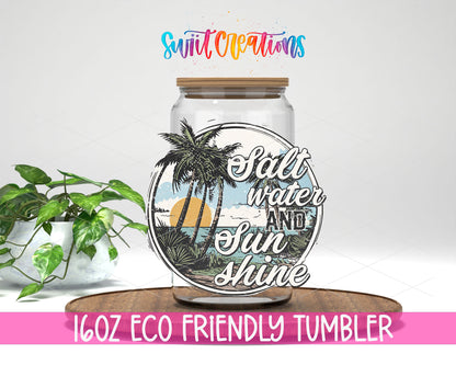 Salt Water and Sunshine Palms design on a 16 oz clear glass tumbler with bamboo lid