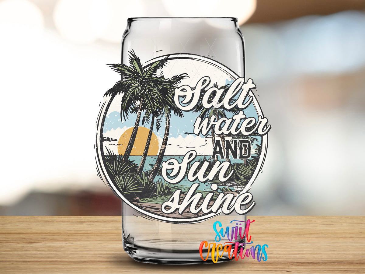Salt Water and Sunshine Palms design close-up on a clear glass can tumbler