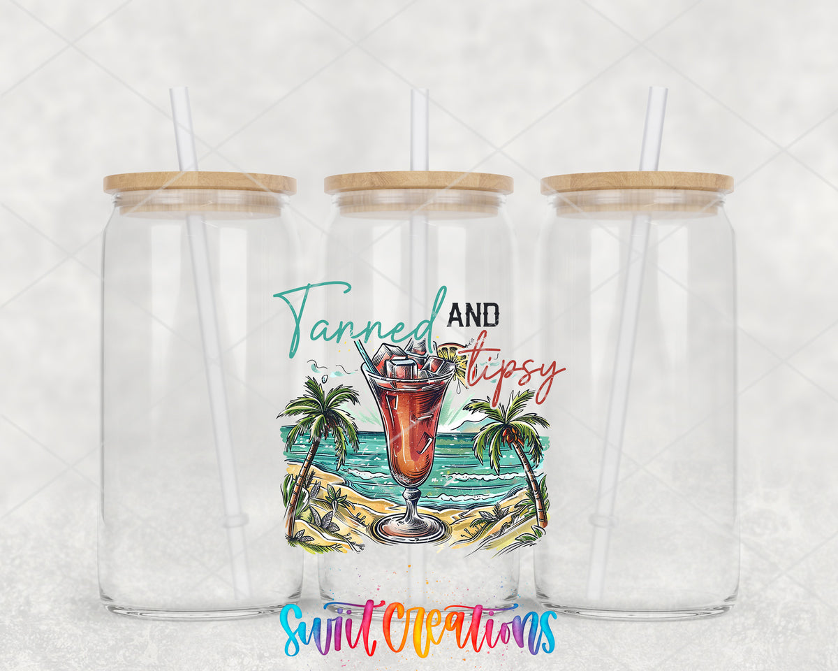Tanned and Tipsy Tropical clear glass tumbler group mockup with bamboo lids and straws