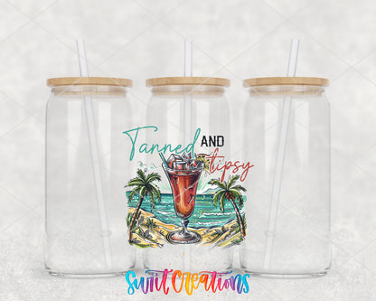Tanned and Tipsy Tropical clear glass tumbler group mockup with bamboo lids and straws