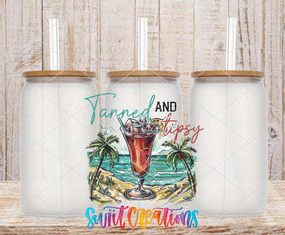 Tanned and Tipsy Tropical frosted glass tumbler mockup with bamboo lids and straws