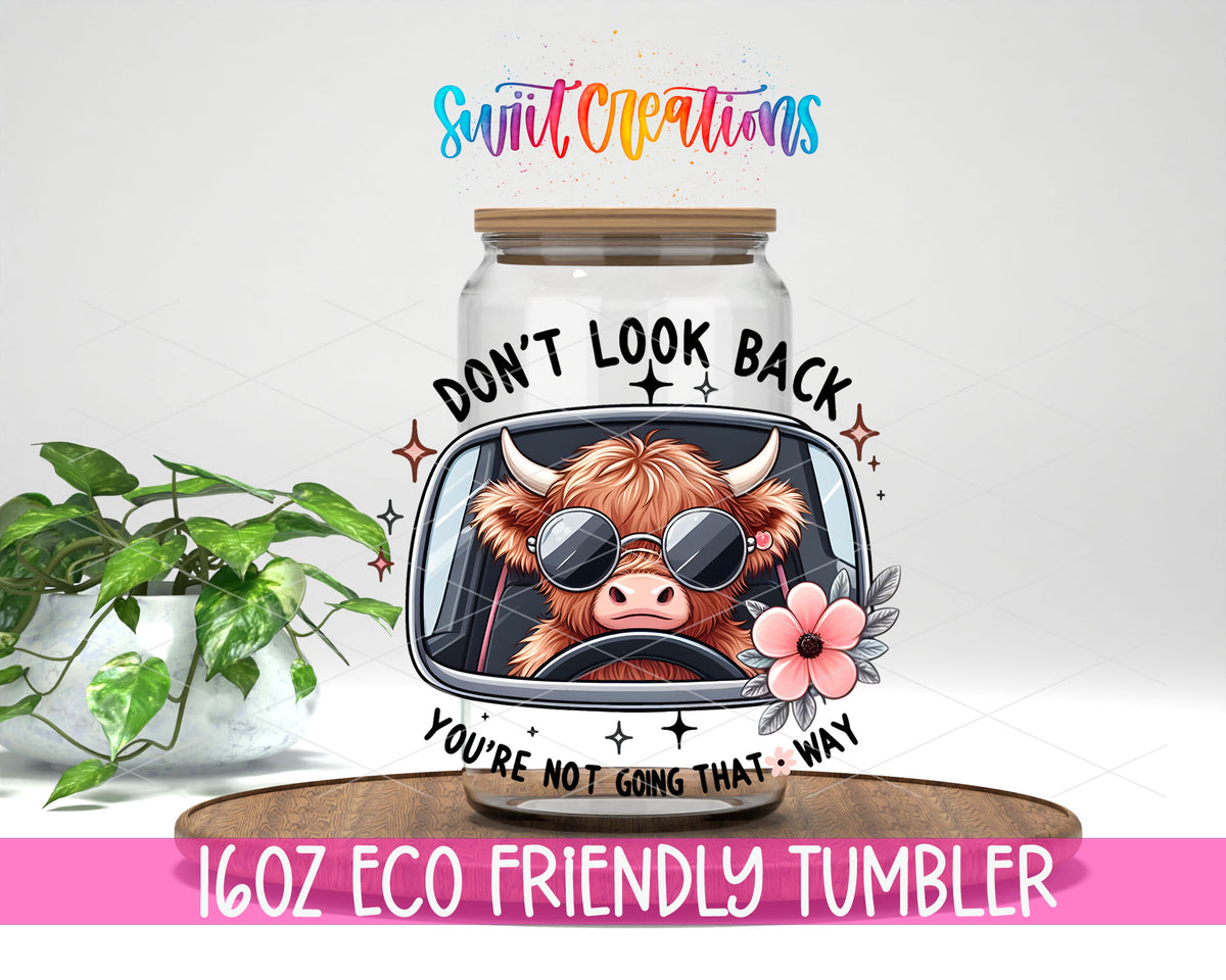 Do Not Look Back Cow design on a 16 oz clear glass tumbler with bamboo lid