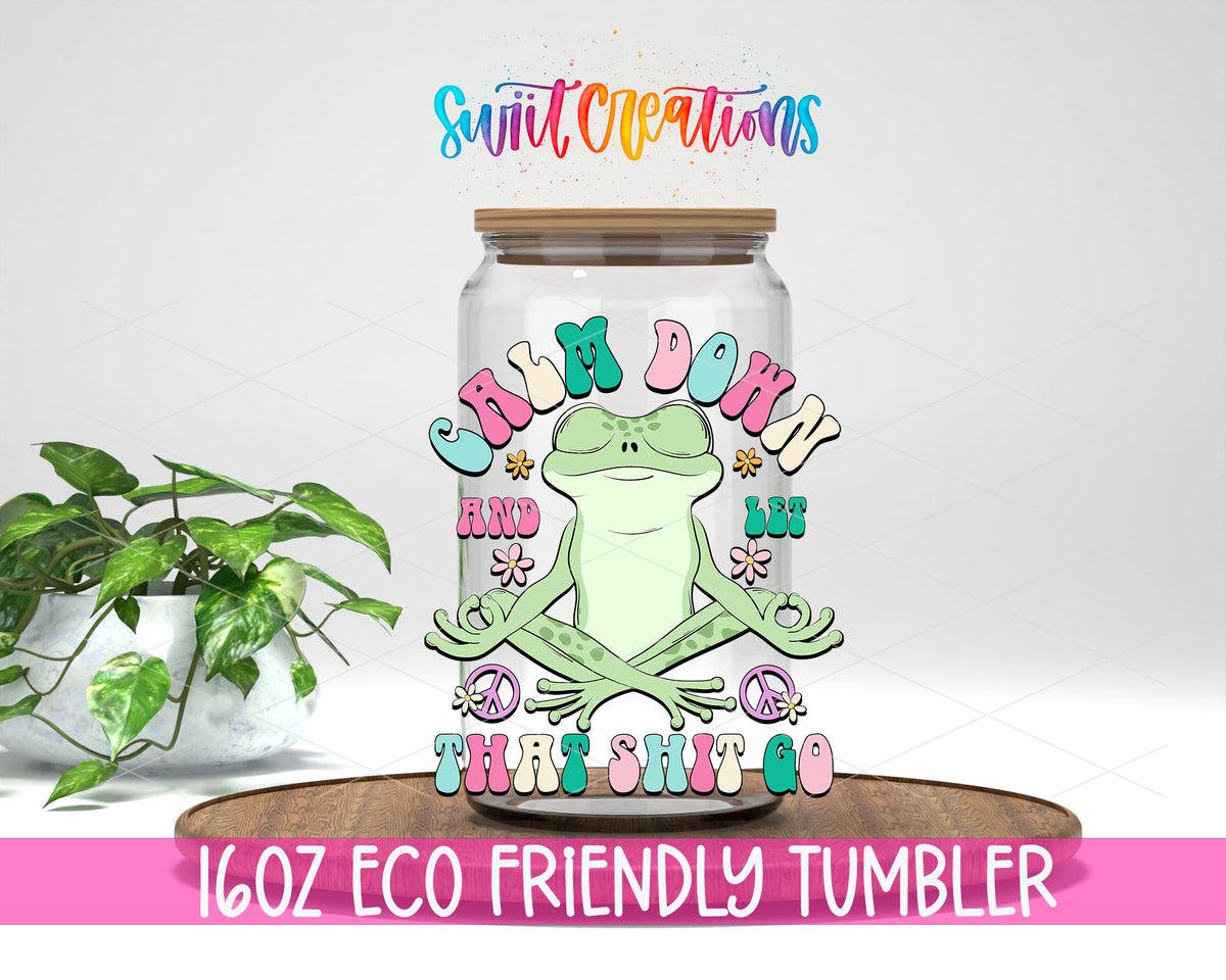 Calm Down and Let That Shit Go design on a 16 oz clear glass tumbler with bamboo lid
