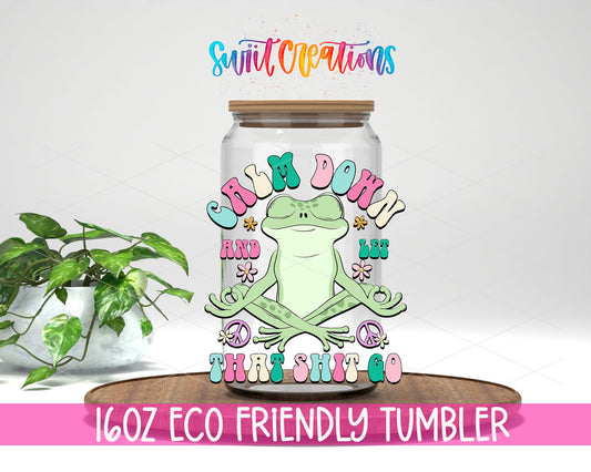 Calm Down and Let That Shit Go design on a 16 oz clear glass tumbler with bamboo lid