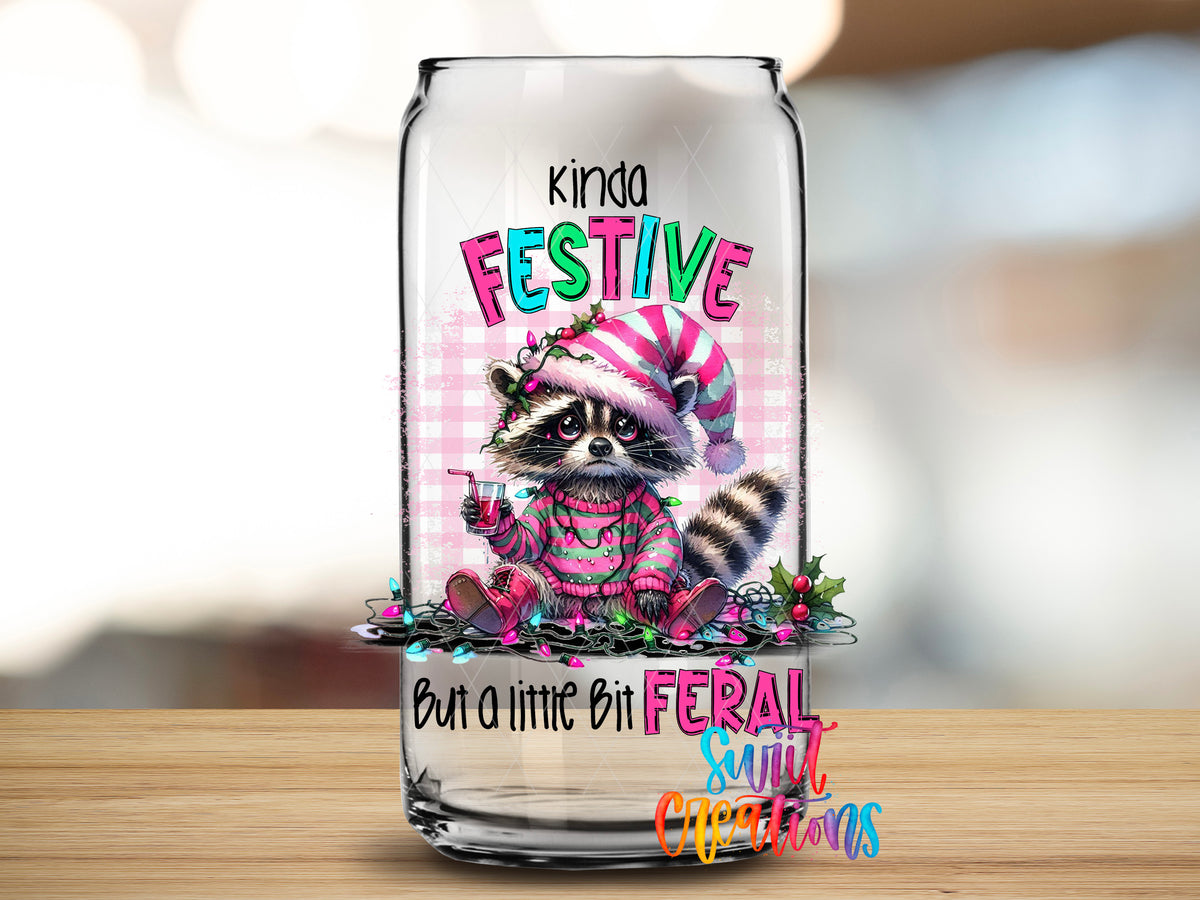 Kinda Festive Kinda Feral design close-up on a clear glass can tumbler