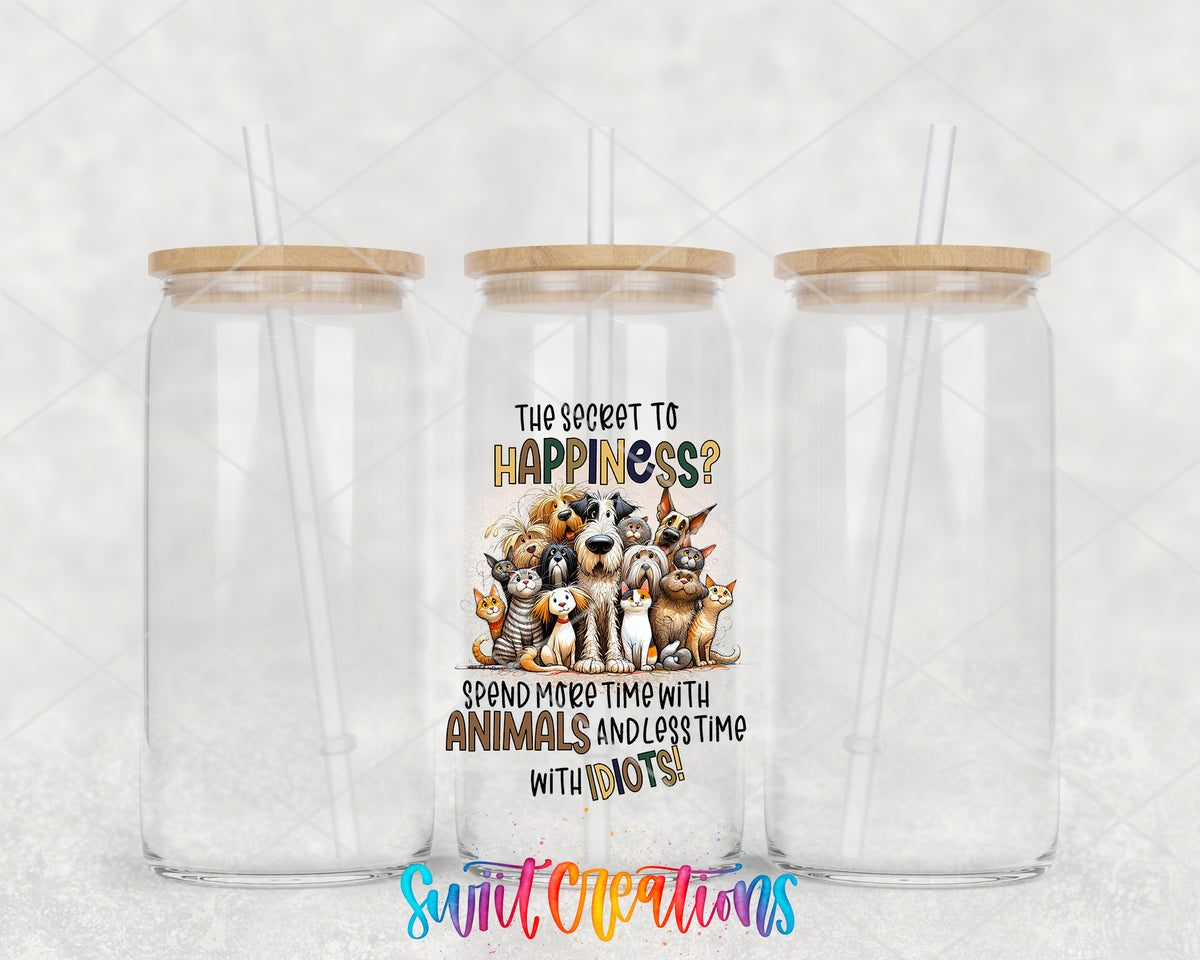 The Secret to Happiness Animals clear glass tumbler group mockup with bamboo lids and straws