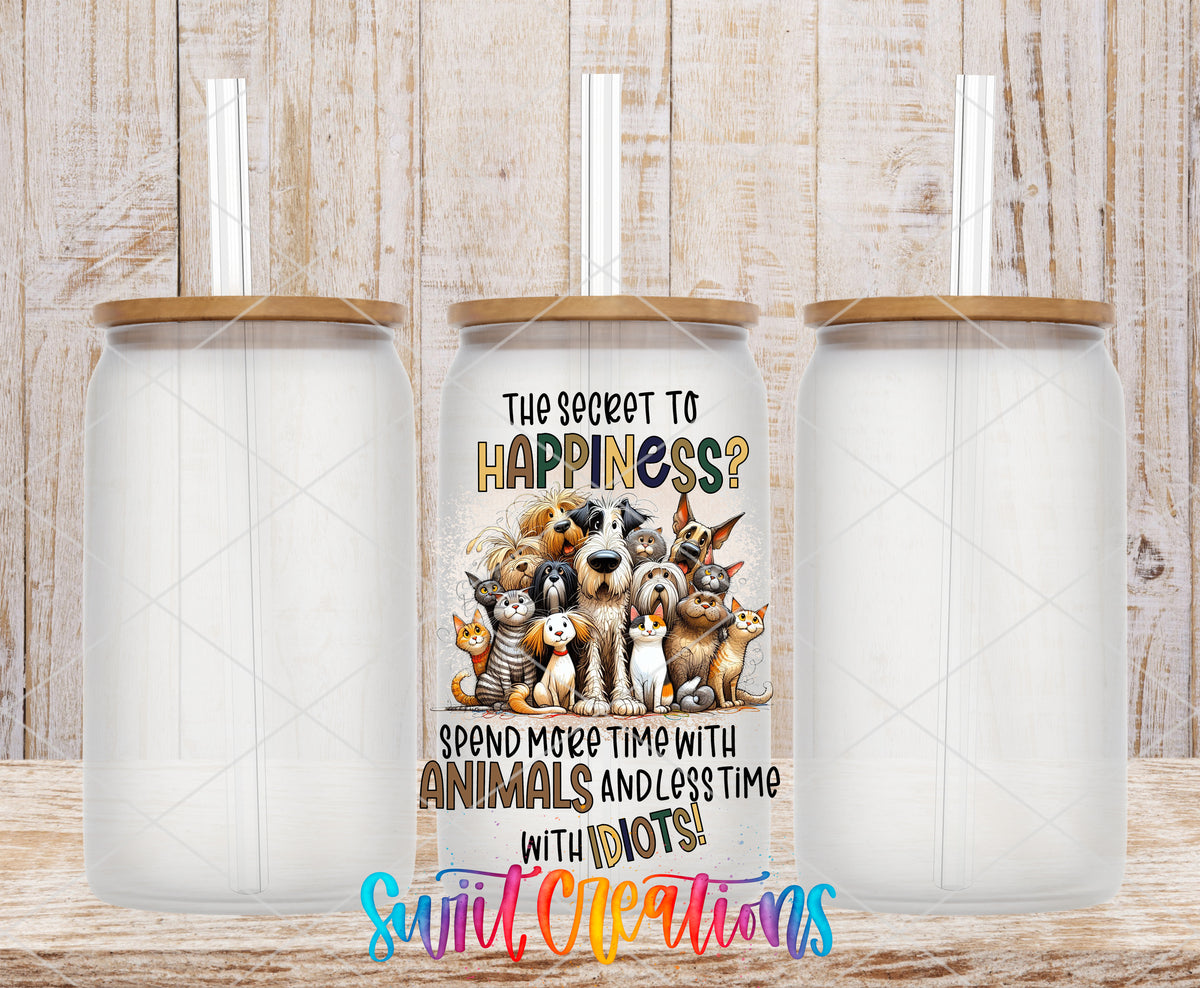 The Secret to Happiness Animals frosted glass tumbler mockup with bamboo lids and straws