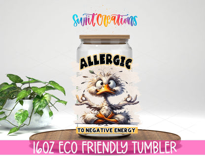 Allergic to Negative Energy design on a 16 oz clear glass tumbler with bamboo lid