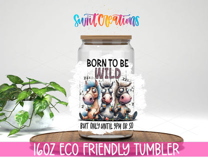 Born to Be Wild Cows design on a 16 oz clear glass tumbler with bamboo lid